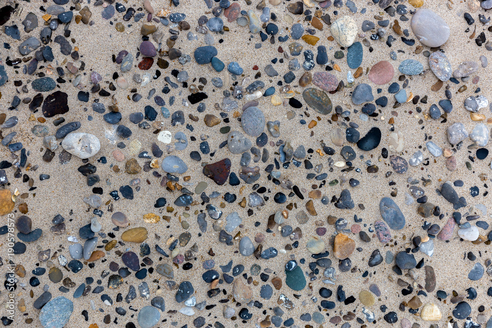 Stones in the sand on danish beach