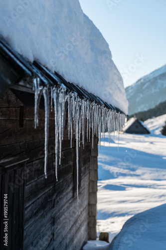 Icicles hanging from a roof