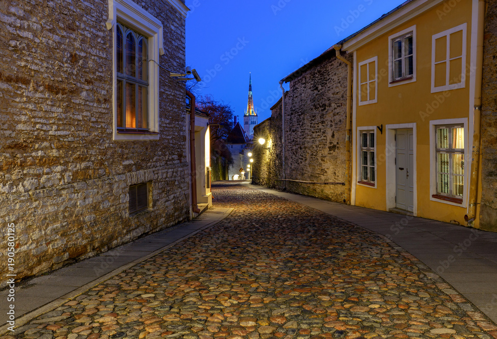 Tallinn. Old medieval street at dawn.