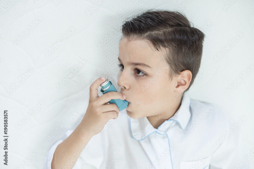 very sick boy who keeps respirator lungs, blows air out of the inhaler very sick boy who keeps respirator lungs, blows air out of the inhaler