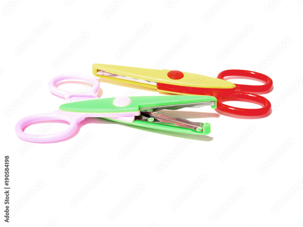 Scissors on white background, one scissors is open to dangerous if not careful Scissors on white background, one scissors is open to dangerous if not careful