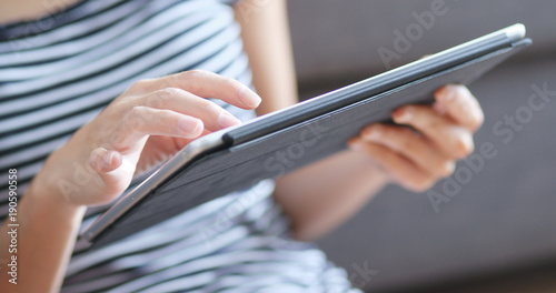 Young Woman using digital tablet computer