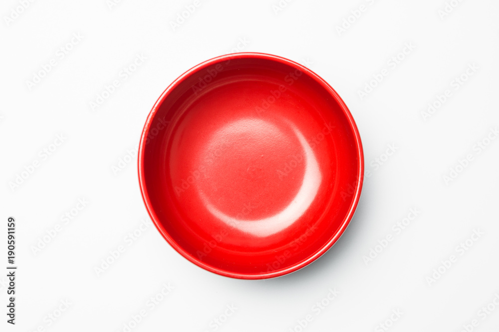 Red bowl on white background - obrazy, fototapety, plakaty 