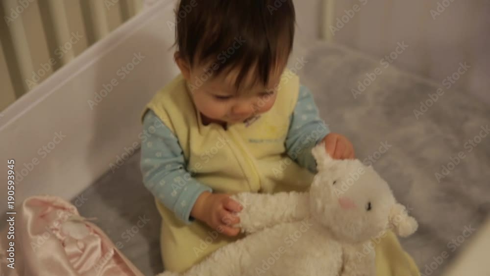 Cute Baby Playing Laughing and Cooing in Crib Cute Baby Playing Laughing and Cooing in Crib