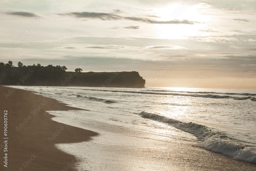 scenery of the sun that will going down at beautiful beach scenery of the sun that will going down at beautiful beach