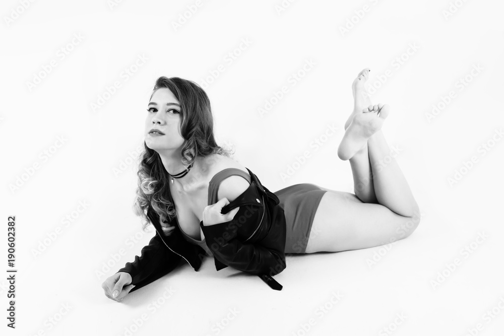 Black and white woman in trenchcoat erotic photo