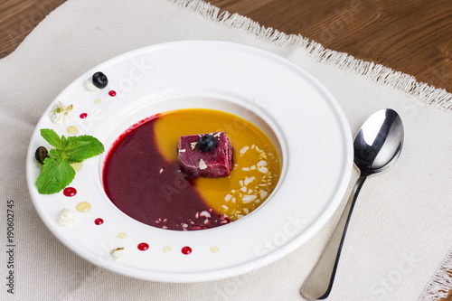 Organic raw food vegan berry ice cream soup in the bowl