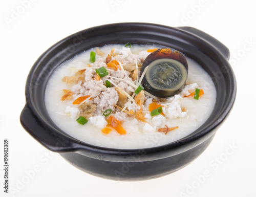 Fotografie Traditional chinese century egg & pork porridge rice gruel served in claypot