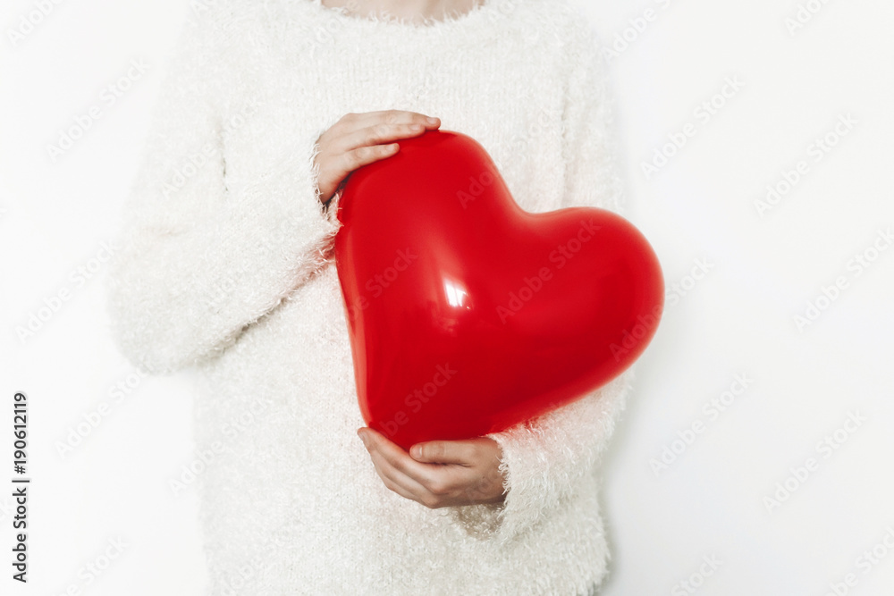 red heart in woman hands, isolated on white backgound. happy valentine's day concept. healthcare, medicine and blood donation donor concept. love and protection. space for text