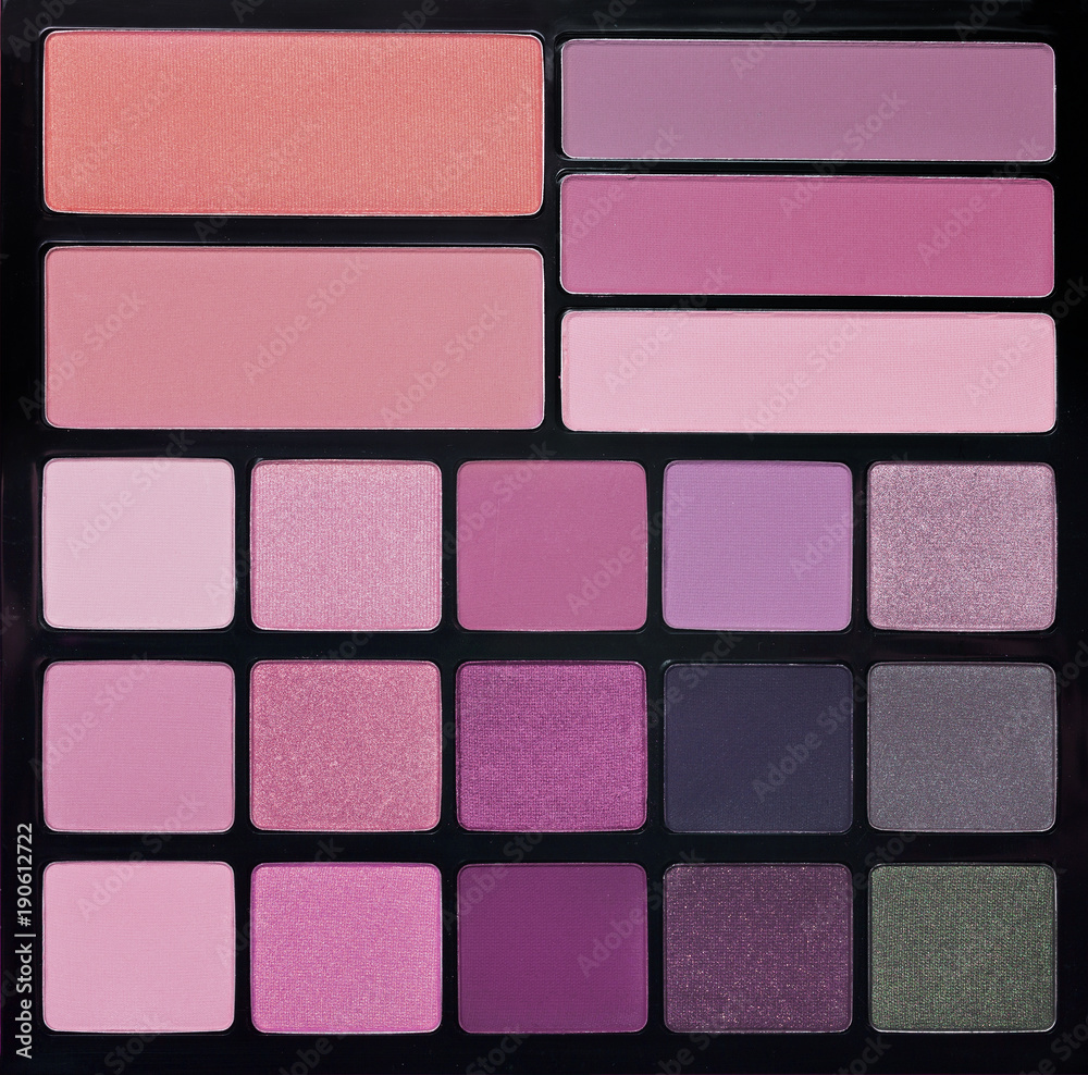 Palette of colorful eyeshadows from high view Palette of colorful eyeshadows from high view