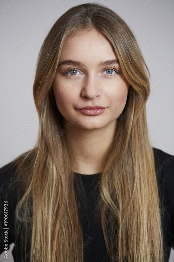 Young and beautiful woman looking to camera, studio Young and beautiful woman looking to camera, studio