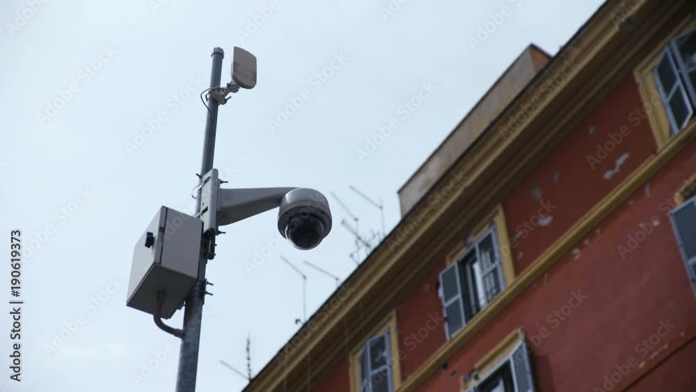 Surveillance video camera on wall Surveillance video camera on wall