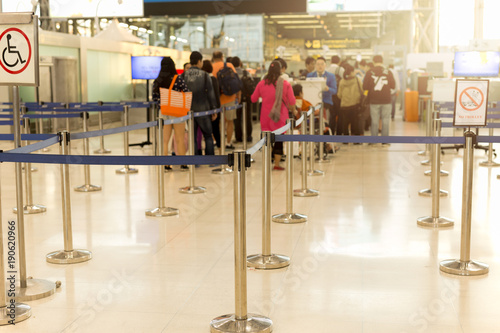 Passengers check-in line at the airport