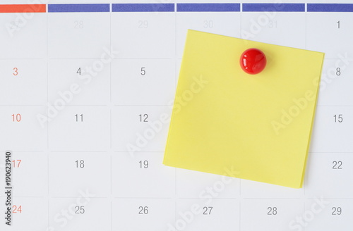 Paper notes on calendar with copy space for writing your task or new idea.
