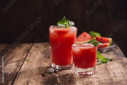 Refreshing summer watermelon in glasses with slices of watermelon