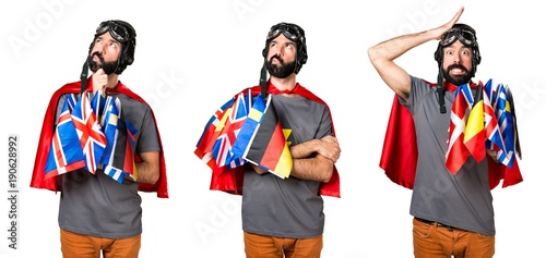 Superhero with a lot of flags thinking