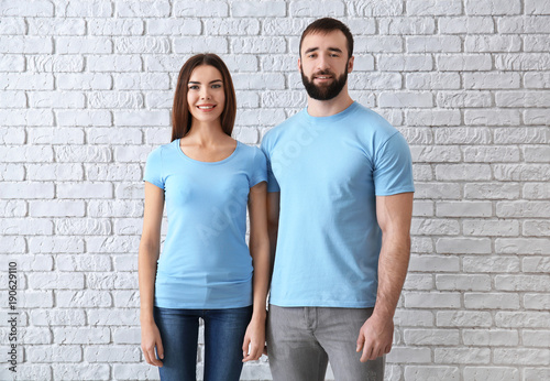 Young man and woman in styl...