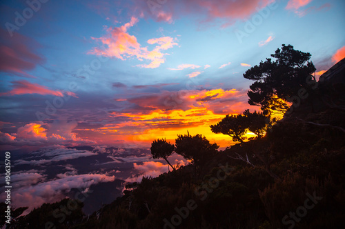 amazing and extreme color of sunset from the mountain © fadzlee