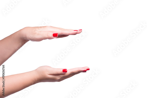 Female hands showing empty space as hand hold card