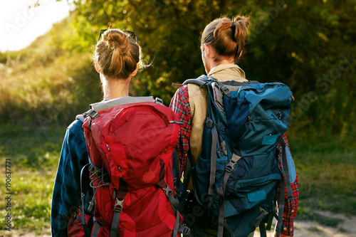 Couple Traveling With Backpack In Nature. Travel photo