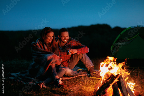 Romantic Weekend. Couple In Love Near Camping In Nature.