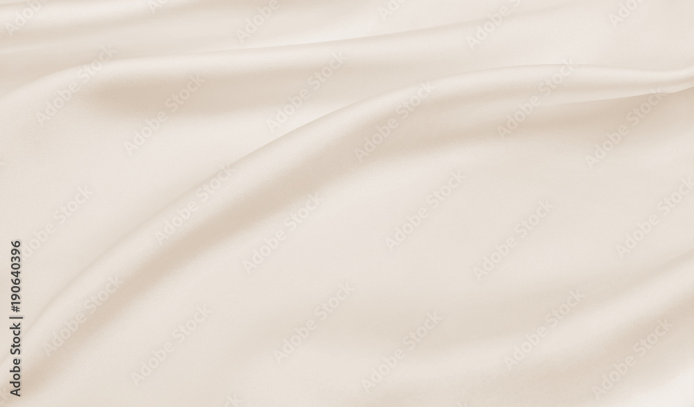 Naklejka premium Smooth elegant golden silk or satin luxury cloth texture as wedding background. Luxurious Christmas background or New Year background design. In Sepia toned. Retro style