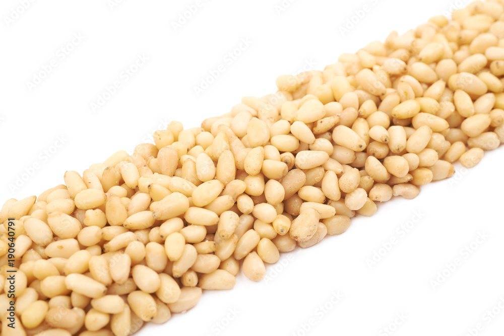 Line made of pine nuts isolated Line made of pine nuts isolated