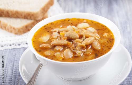 Soup of white bean   in a white plate