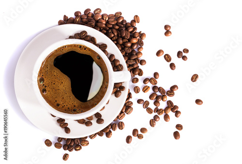 White cup with coffee beans