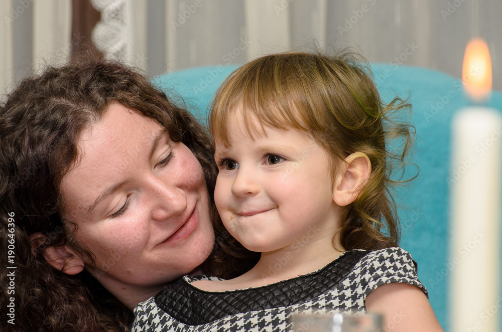 Mom with a little caucasian girl, they are happy. Mom with a little caucasian girl, they are happy.