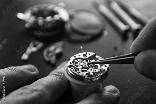 The process of repair of mechanical watches photo