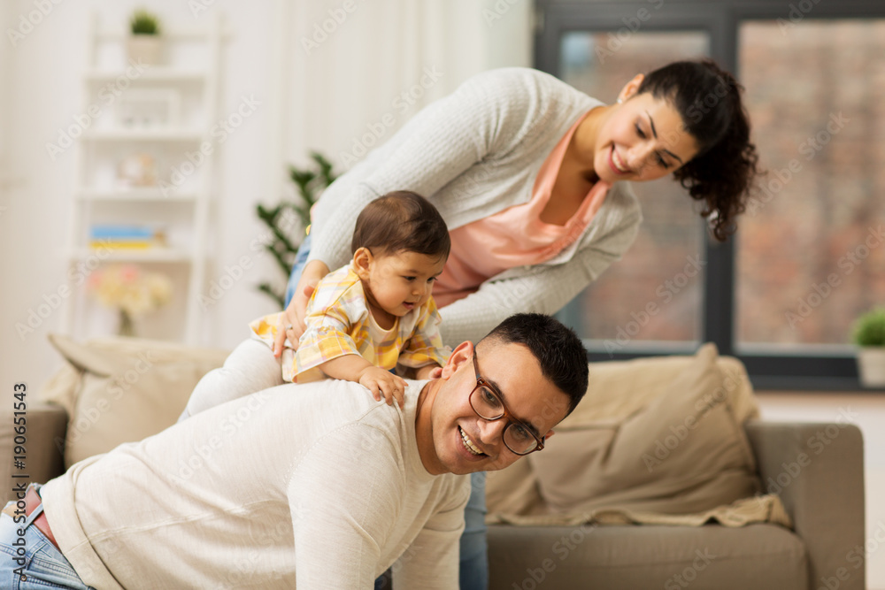 happy family and baby daughter playing at home happy family and baby daughter playing at home