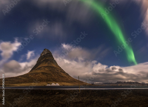 Aurora blasted in sky over Kirkjufell mountain at night, Iceland