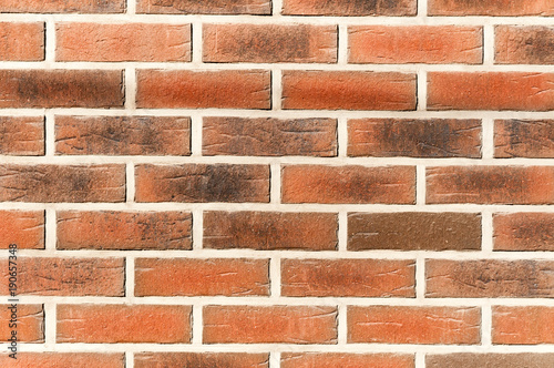 Decorative brickwork as decoration of building or house exterior facade wall close up