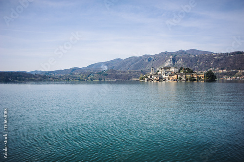 view of the island of San Giulio on Lake Orta piedmont italy