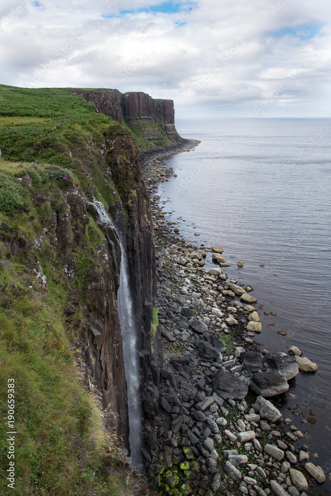 Waterfall overlooking the ocean on the island of Skye