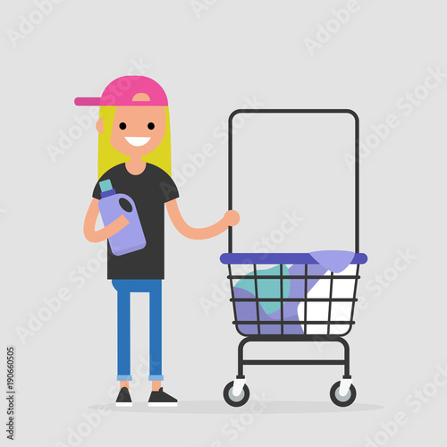 Daily routine. Young female character washing clothes in a public coin laundry. Flat editable vector illustration, clip art