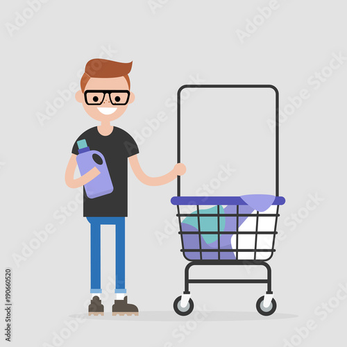 Daily routine. Young character washing clothes in a public coin laundry. Flat editable vector illustration, clip art
