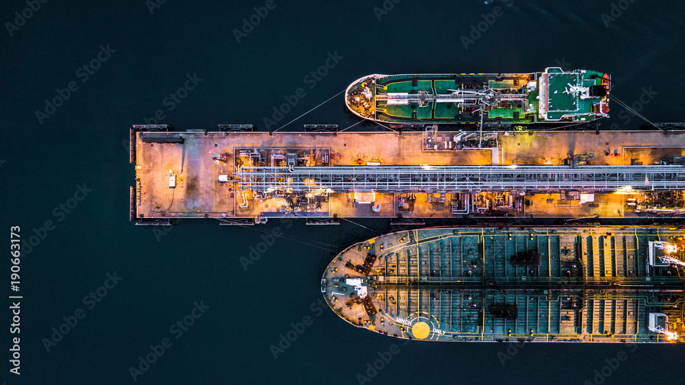 Aerial view of oil tanker ship at the port, Aerial view oil terminal is ...
