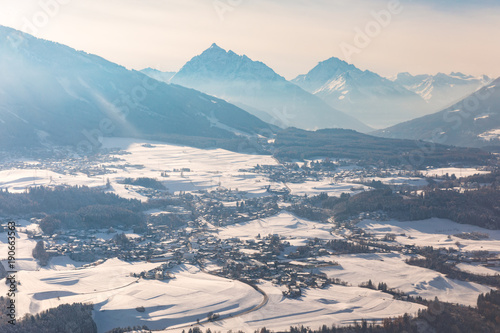 Aerial snow panorama in Austria aith Alps on background photo