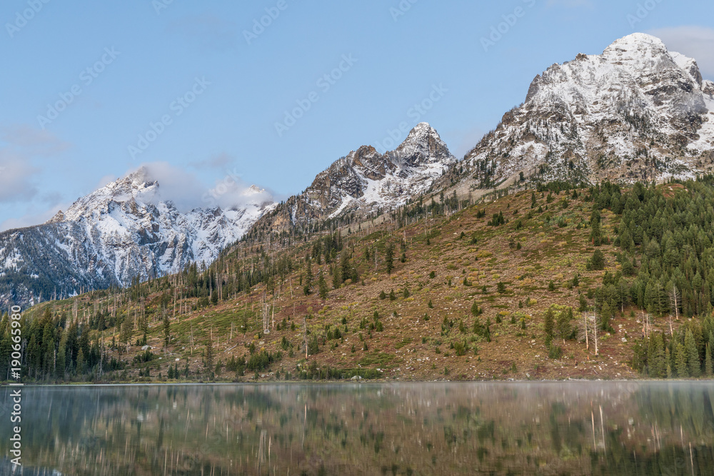 Scenic Sunrise Reflection of the Tetons in String Lake