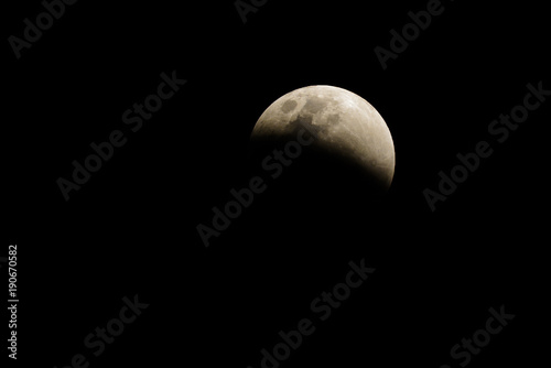 Lunar eclipse, beautiful moon in dark night, Thailand. photo