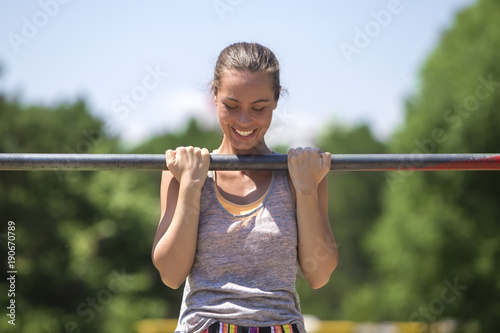 Woman doing lifting up on t...