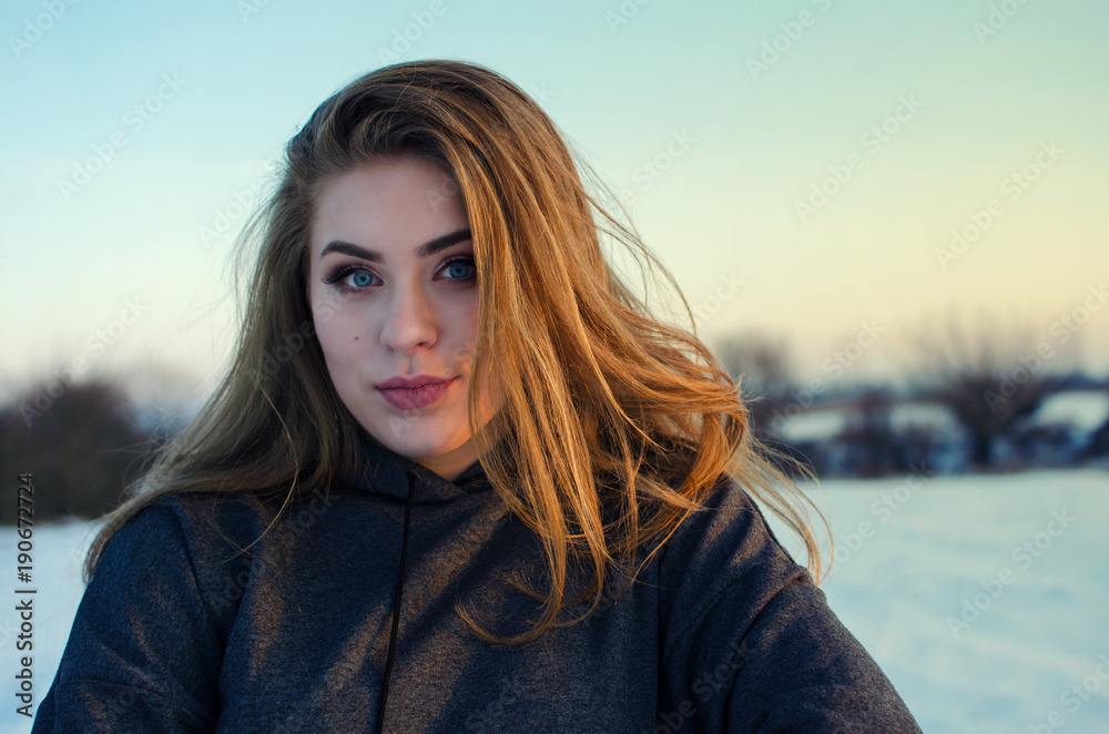 Young smiling girl in the winter Young smiling girl in the winter