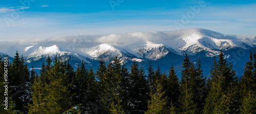 Foggy mountains. Winter in mountains. Winter in Ukraine. Winter landscape.