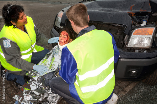 Protecting blanket for injured woman