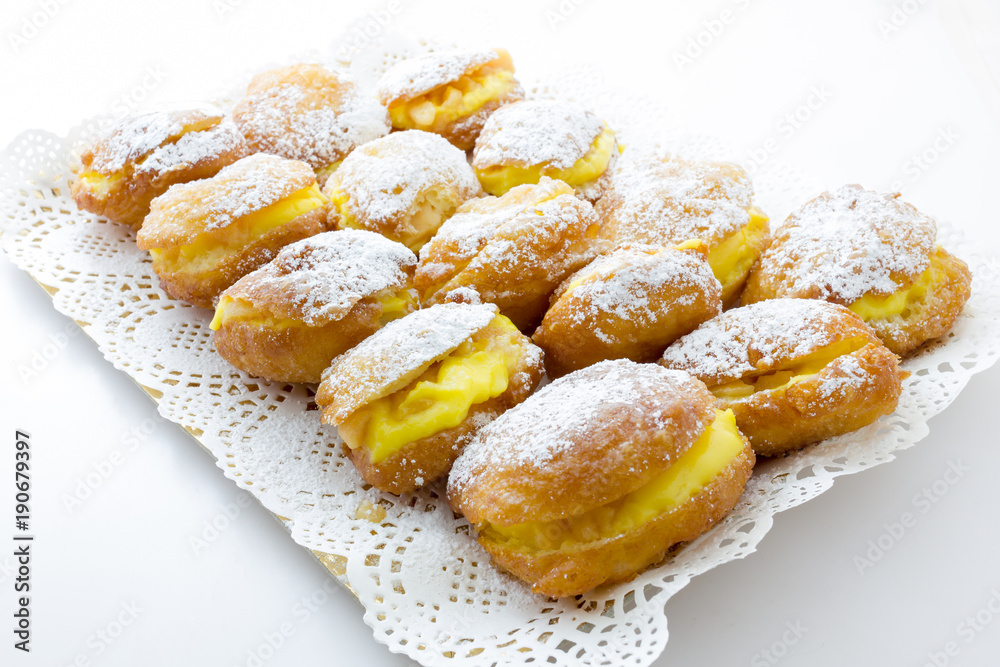 Handmade krapfen filled with pastry cream