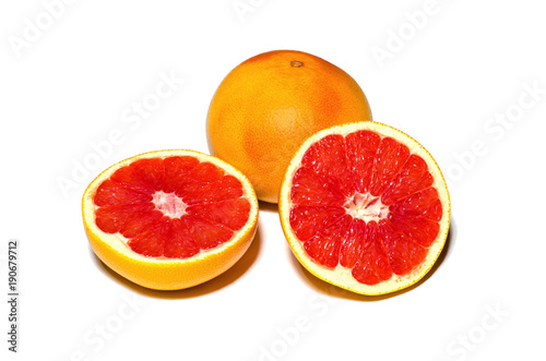 Grapefruit whole and halves on white background