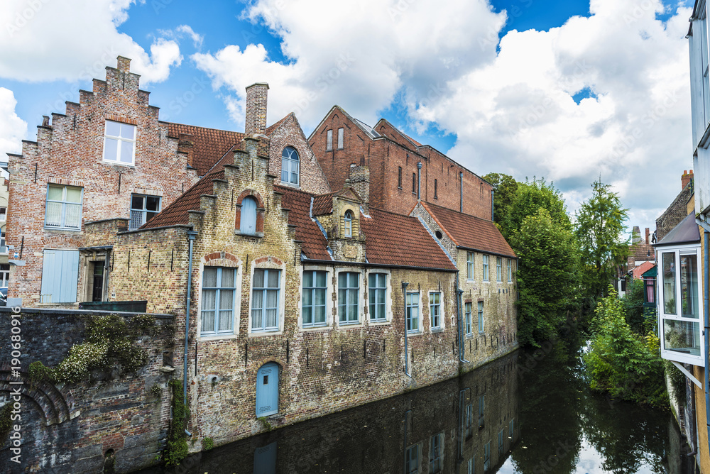 Old traditional houses along the river in Bruges, Belgium Old traditional houses along the river in Bruges, Belgium