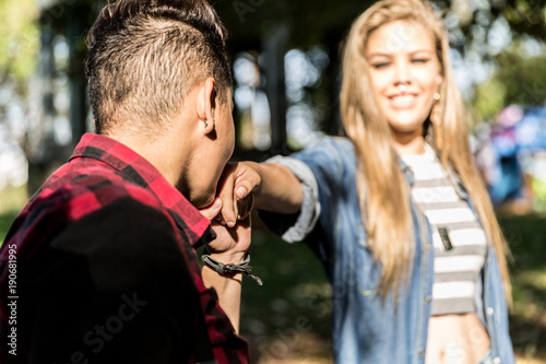 Lesbian Girl Kissing Hand of Her Girlfriend - Proposal Concept © gustavofrazao